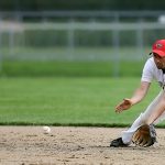 man playing baseball